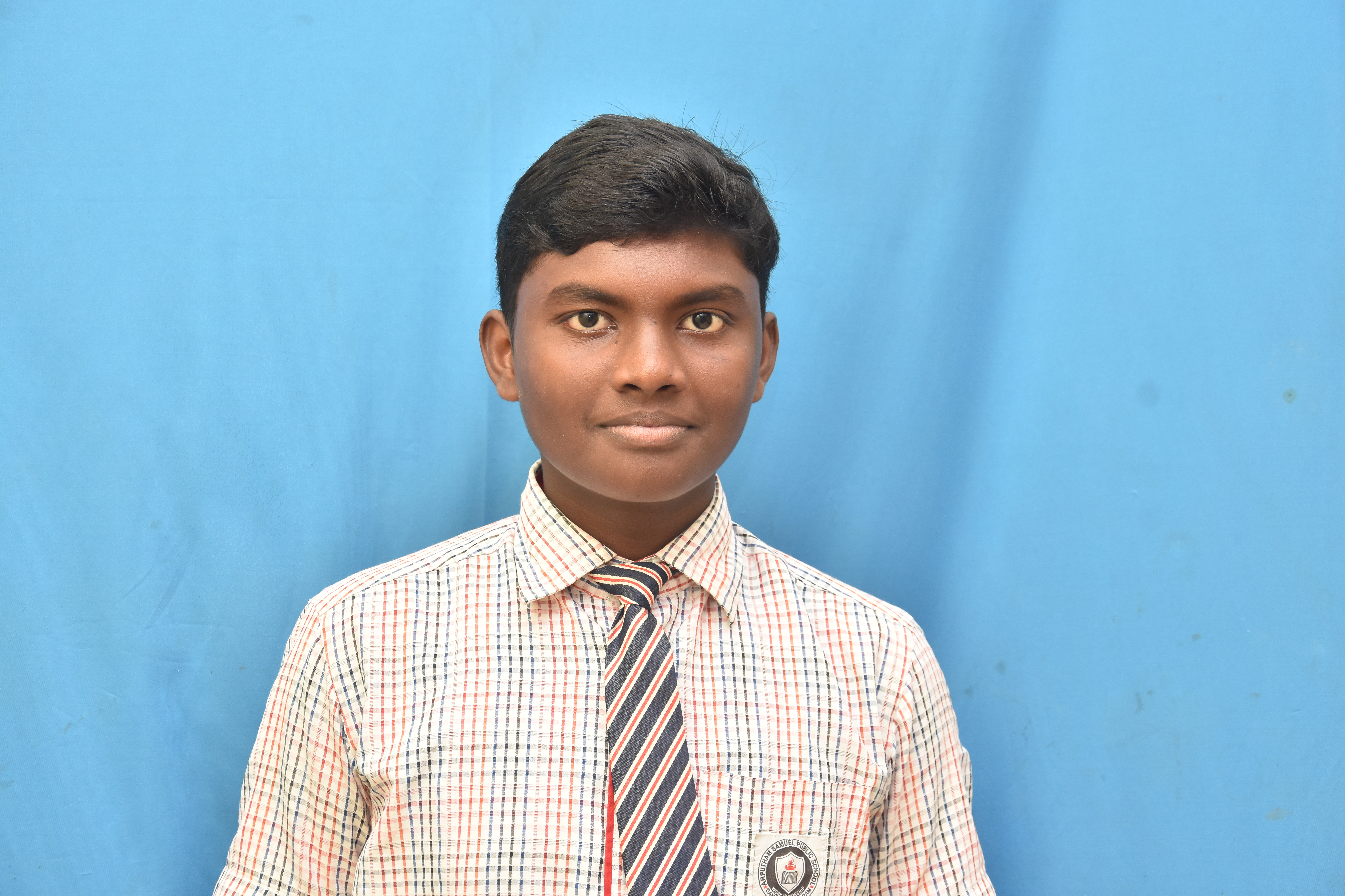 Naveen R